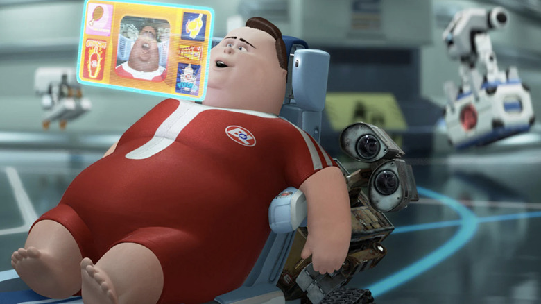 WALL-E helps a human aboard the Axiom in WALL-E