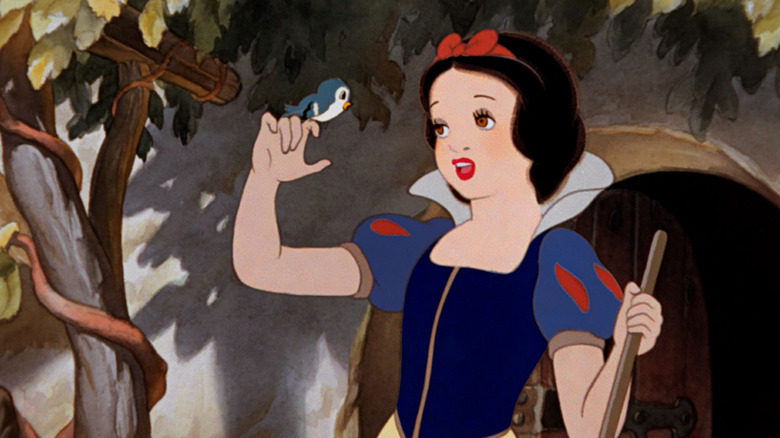 Snow White singing to a bird in Snow White and the Seven Dwarfs