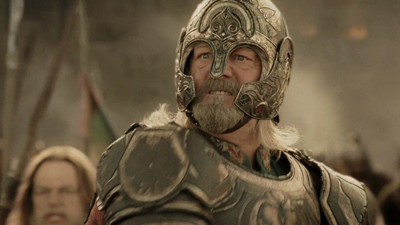 Théoden wearing his armor in battle in the Lord of the Rings trilogy