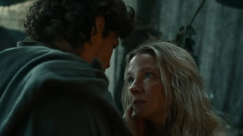 Elrond strokes Galadriel's cheek