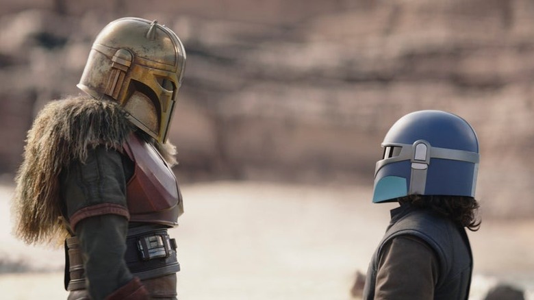 Armorer talking to a foundling in The Mandalorian