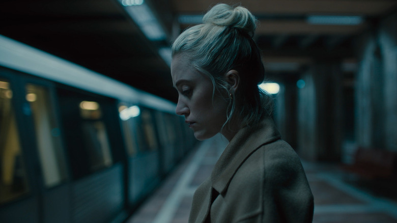 Watcher Maika on a subway platform