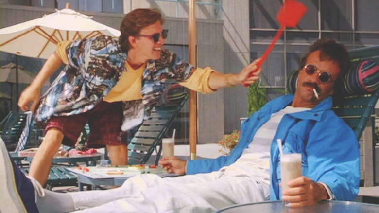 Andrew McCarthy and Terry Kiser in Weekend at Bernie's