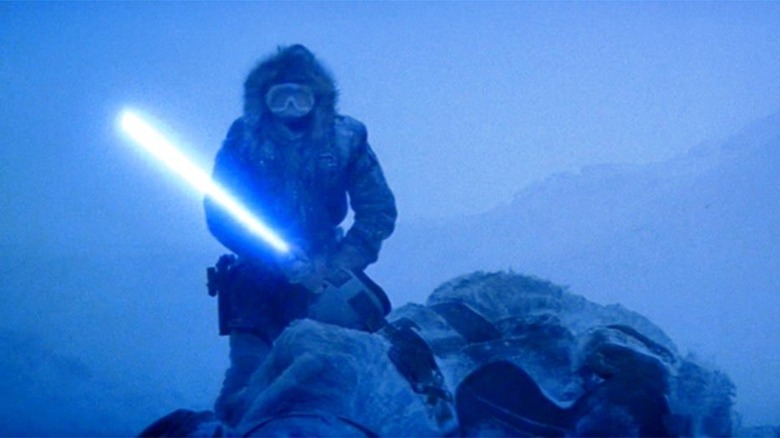 Han uses Luke's lightsaber on Hoth