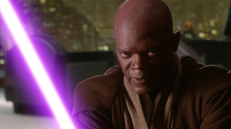 Mace Windu frowning and holding purple lightsaber