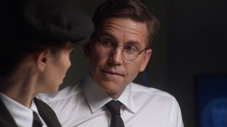 Brian Dietzen as Jimmy Palmer looking somber in NCIS