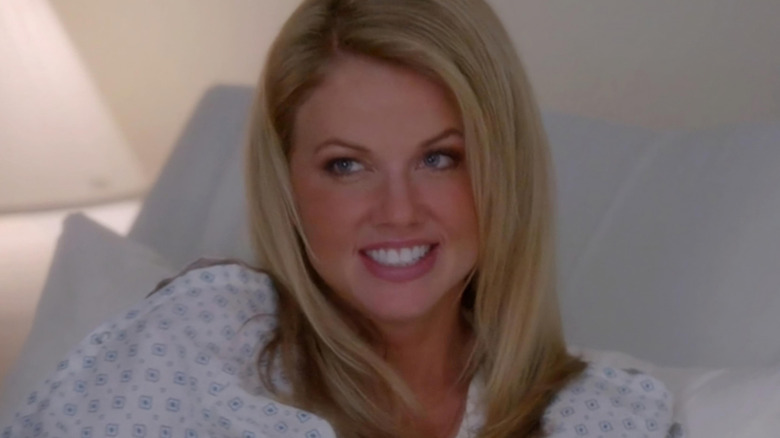 Michelle Pearce as Breena Palmer in a hospital bed in NCIS We Build We Fight