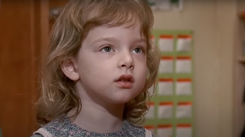 Sarah Rose Karr as Emma looks nervous in Kindergarten Cop