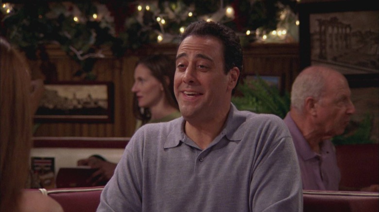 Brad Garrett as Robert Barone laughs on Everybody Loves Raymond