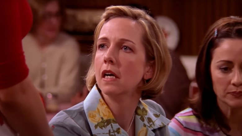 Monica Horan as Amy stare at another woman in Everybody Loves Raymond