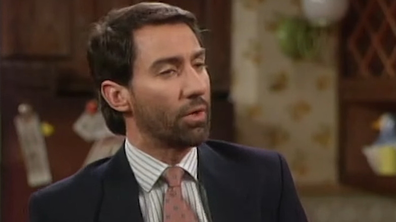 David Garrison as Steve Rhoades, sporting a beard and talking to the Bundys on Married with Children