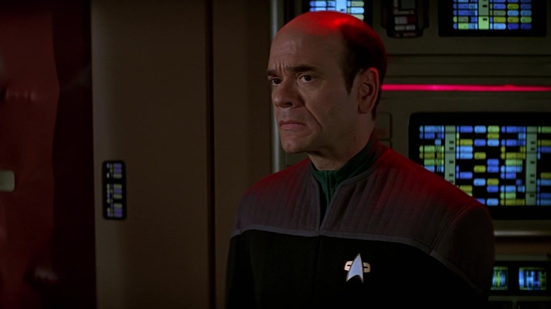 Robert Picardo as the Emergency Medical Hologram looking on in Star Trek: First Contact