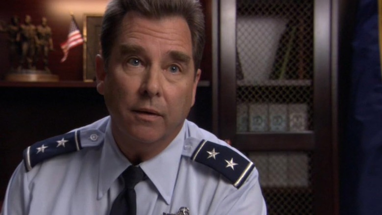 Beau Bridges' Hank in military dress in an office on Stargate SG-1