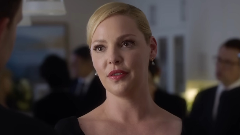 Katherine Heigl as Samantha Wheeler, having a conversation at a party on Suits