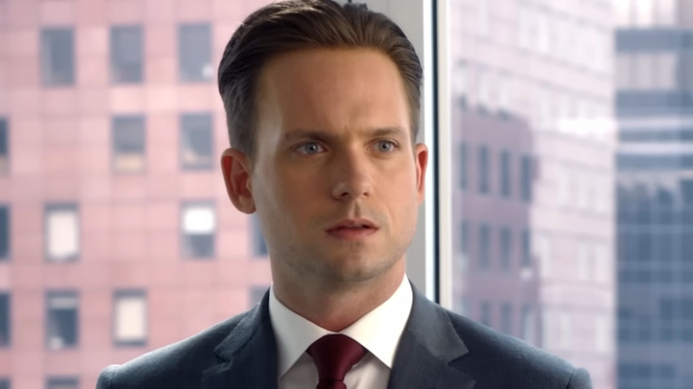 Patrick J. Adams as Mike Ross looking confused in his office on Suits