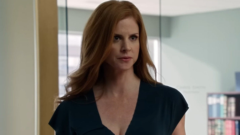 Sarah Rafferty as Donna Paulsen, smirking on Suits