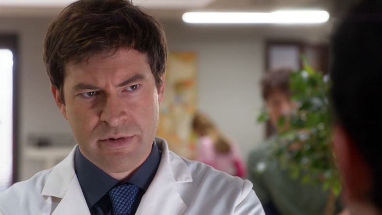 A closeup of Brendan (Mark Duplass) looking angry, on The Mindy Project