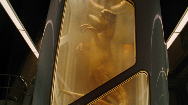 A raptor in a cryo tube in a research lab in Jurassic World Rebirth