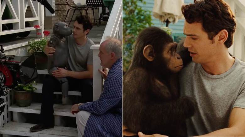 James Franco holding a bust of a monkey in Rise of the Planet of the Apes