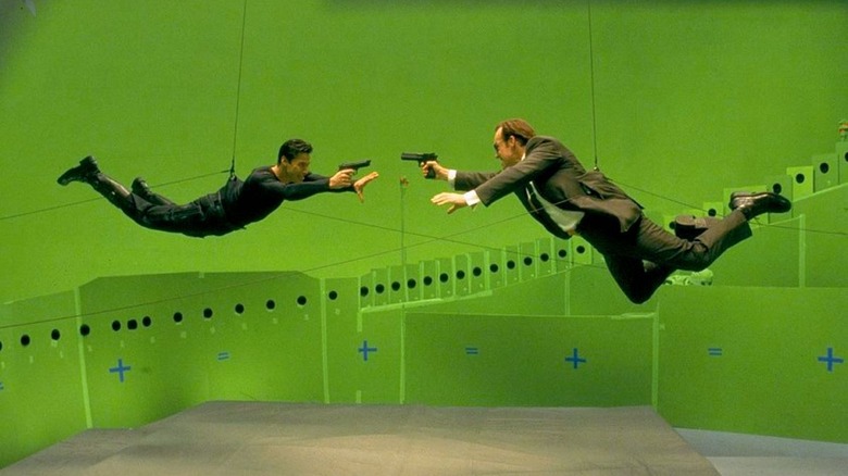 Keanu Reeves and Hugo Weaving with a bullet time camera rig