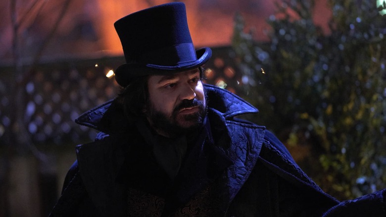 Laszlo outside in a top hat in "What We Do in the Shadows?"