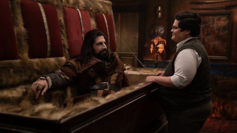 Nandor lies in his coffin while he talks to Guillermo in What We Do in the Shadows