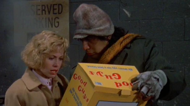 The Peddler gives Karen a boxed Good Guy doll