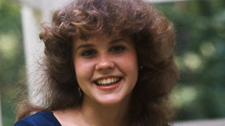 Linda Blair feathered hair portrait at home