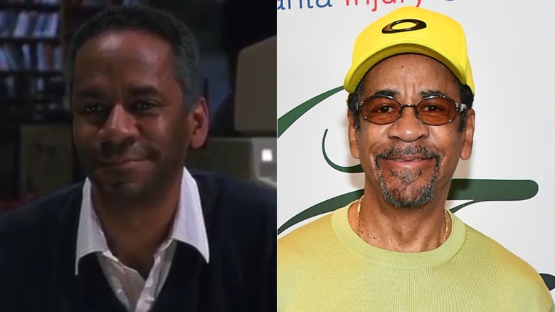 Mike smiling and Tim Reid at golf event