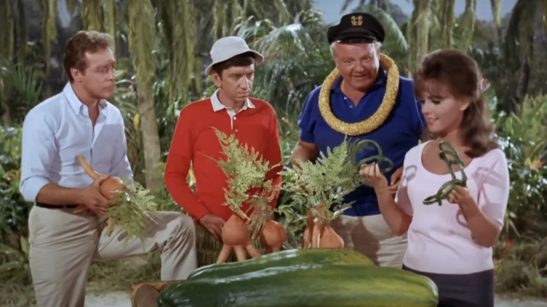 Bob Denver's Gilligan and huddle round some vegetables in Gilligan's Island