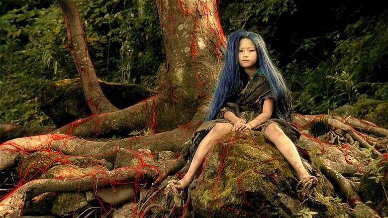 A blue-haired child from Imprint