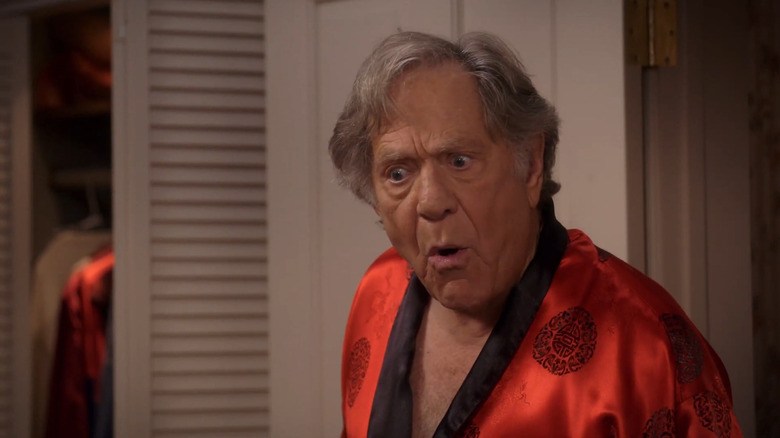 George Segal as Pops Solomon pulling a face in The Goldbergs