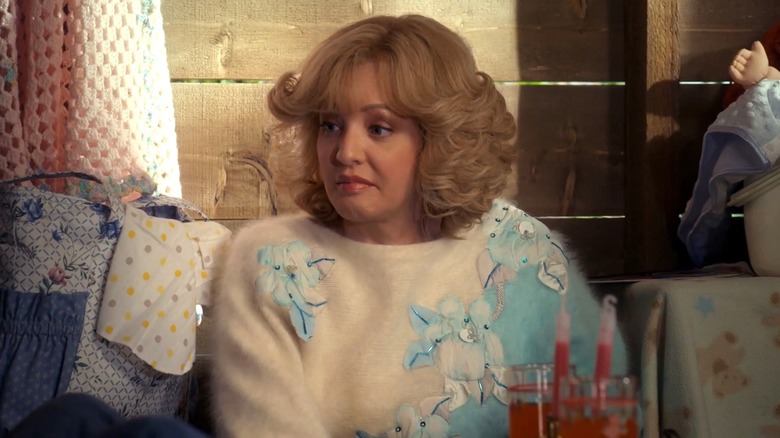 Wendi McLendon-Covey as Beverly Goldberg looking to the side in The Goldbergs