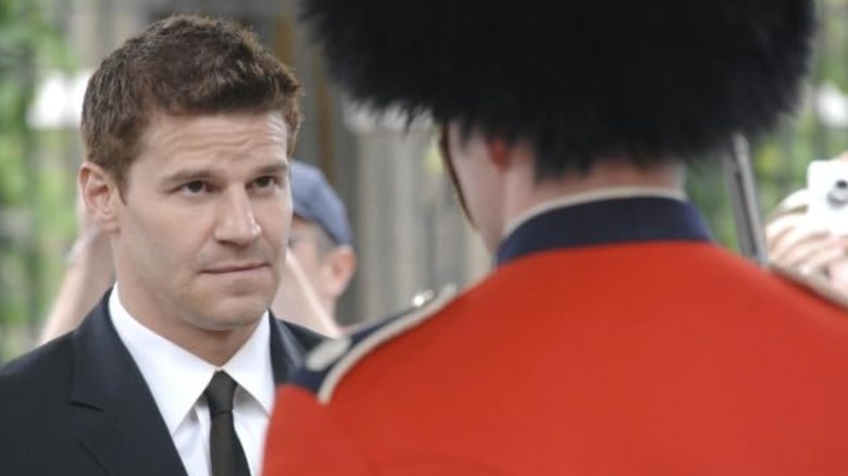 David Boreanaz's Booth stares down a British royal guard in full regalia on Bones