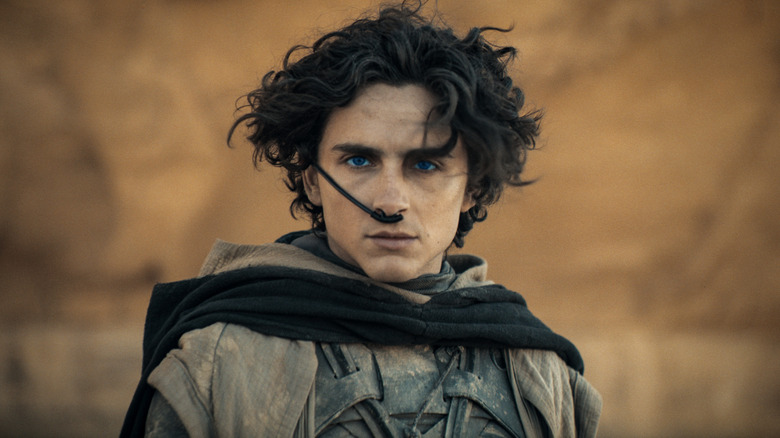 Timothée Chalamet's Paul Atreides looks ahead with blue eyes in Dune Part Two