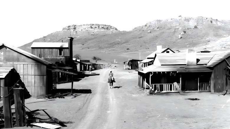 A cowboy riding into town on "Gunsmoke"