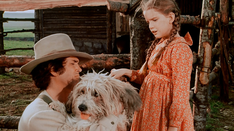 Michael Landon as Charles Ingalls and Melissa Gilbert as Laura Ingalls on Little House on the Prairie