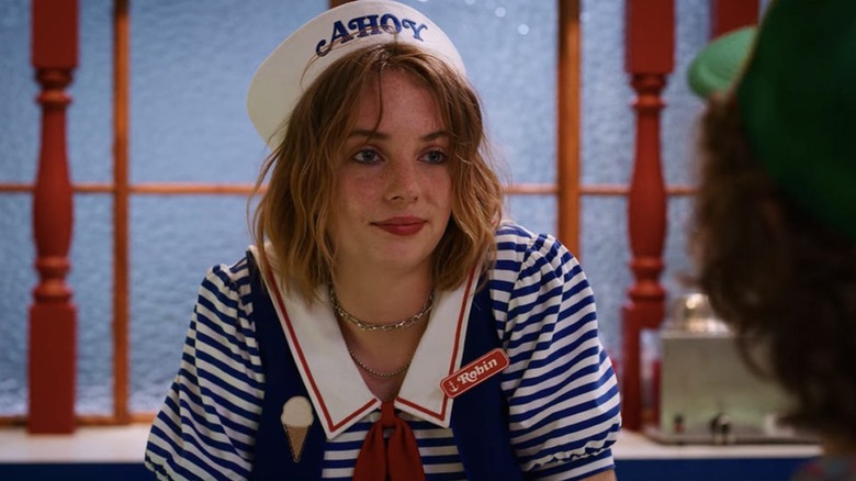 Maya Hawke's Robin wears a Scoops Ahoy cap at the mall in Stranger Things