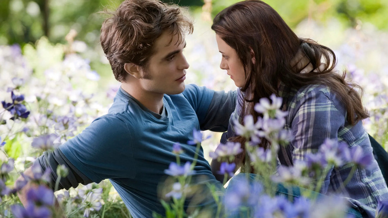 Edward and Bella in a field of flowers in The Twilight Saga: Eclipse