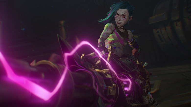 Jinx firing a shot from her giant machine gun and rocket launcher in Arcane