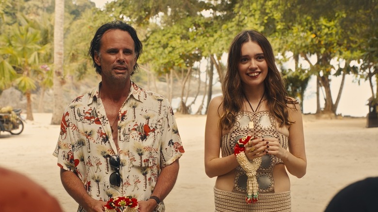 Rick and Chelsea receiving garlands on The White Lotus