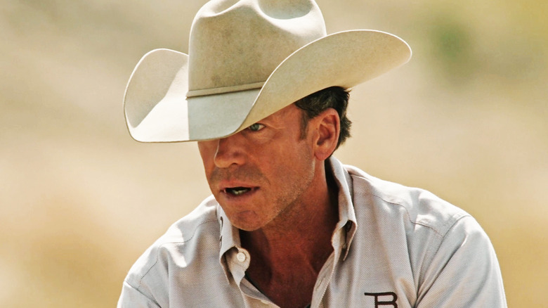 Travis Wheatley wearing a white cowboy hat in Yellowstone