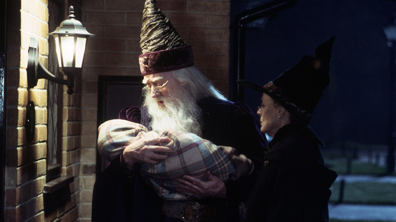 Dumbledore and McGonagall with baby Harry in Harry Potter and the Sorcerer's Stone