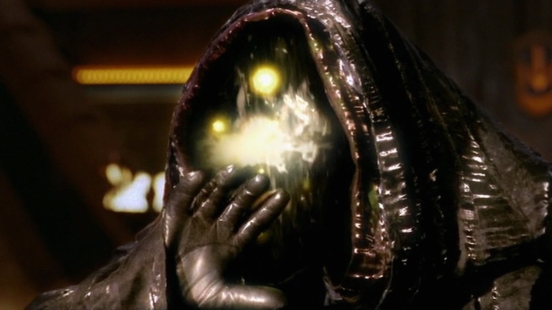 The primary form of Anubis shielding his faceless visage in Stargate SG-1