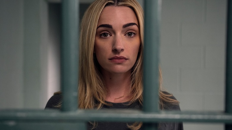 Brianne Howey's Georgia stares out from behind bars in Ginny & Georgia