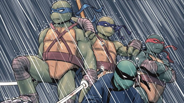 Leonardo, Donatello, Raphael, and Michelangelo standing in the rain on the cover of The Last Ronin: Lost Years #3