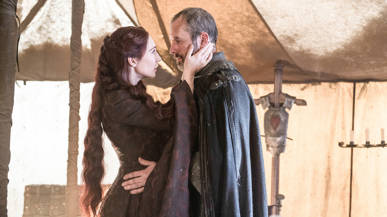 Melisandre holding Stannis' face on Game of Thrones