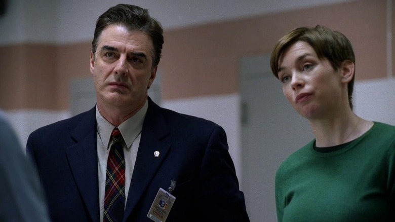 Mike Logan and Megan Wheeler staring at someone on Law & Order: Criminal Intent