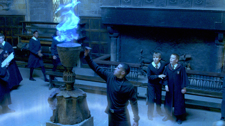 A student entering his name into the Goblet of Fire in Harry Potter and the Goblet of Fire