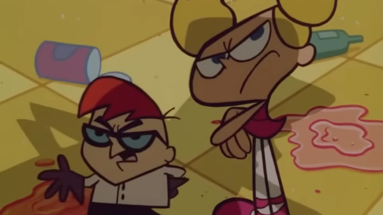 Rude Dexter argues while Dee Dee stands with her arms crossed in Dexter's Laboratory